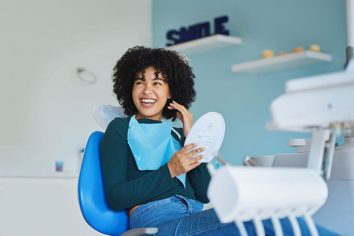 happy-young-woman-at-dental-exam