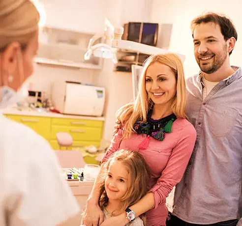 family-at-the-dentist-492x460